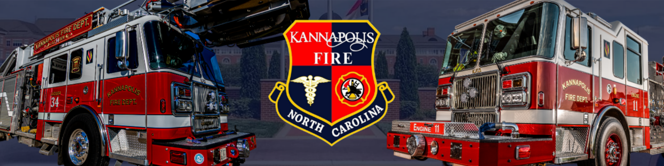 Two Fire Trucks facing each other with kannapolis Fire Department Logo in between them